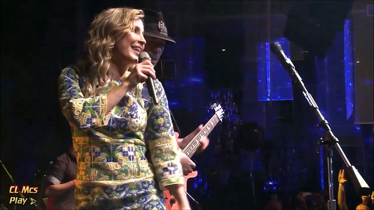 CLAUDIA LEITTE E CARLOS SANTANA AO SOM DE LARGADINHO NO EVENTO DA FIFA