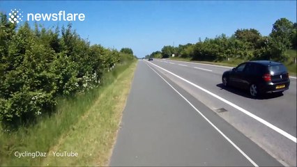 Car escapes nasty crash in tyre-screeching near-miss
