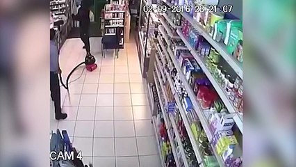 Worker Chased Off Armed Robber Using Vaccum