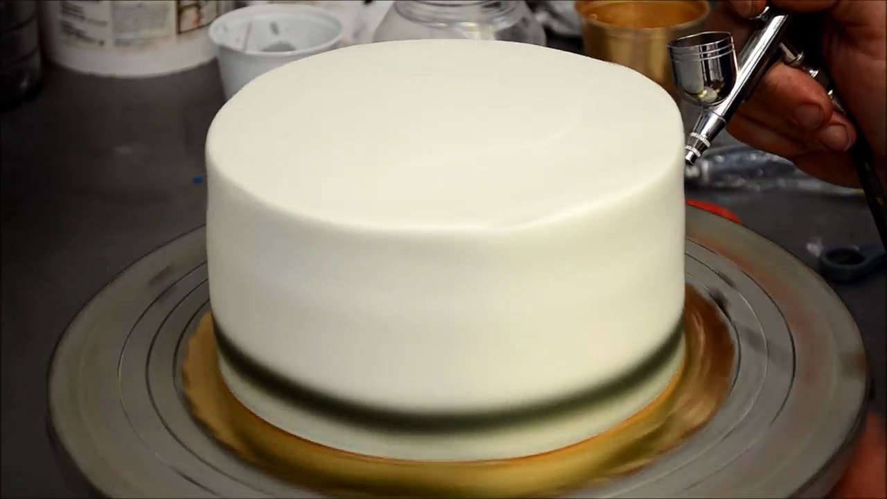 Making a white cake with silver dots