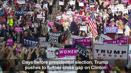Trump pushes to further close gap on Clinton days before vote