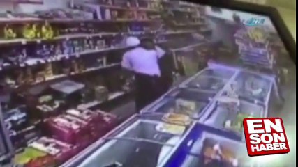 Irak'ta bir polis memuru marketten telefon çaldı