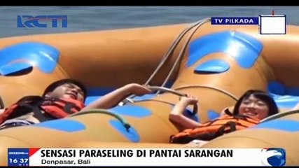 Sensasi Paraseling di Pantai Sarangan