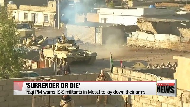 Iraqi PM warns ISIS to lay down arms as militants fortify Mosul