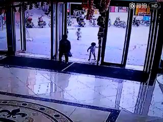 Little girl crushed by collapsing door