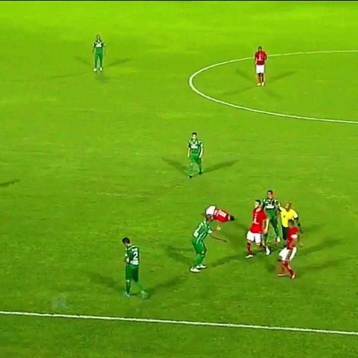 The Player attacks the Referee after he gives Red Card to him