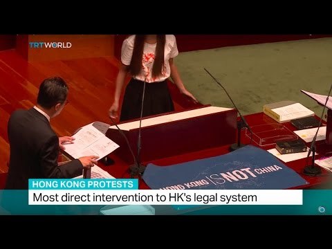 Hong Kong Protests: China passes interpretation of HK's Basic Law