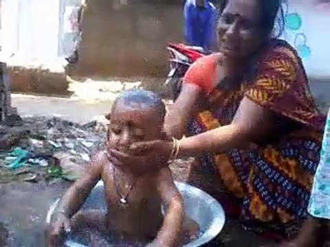 Cute Little Baby Enjoying Bath In Tube