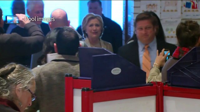 Hillary Clinton casts her vote in US election