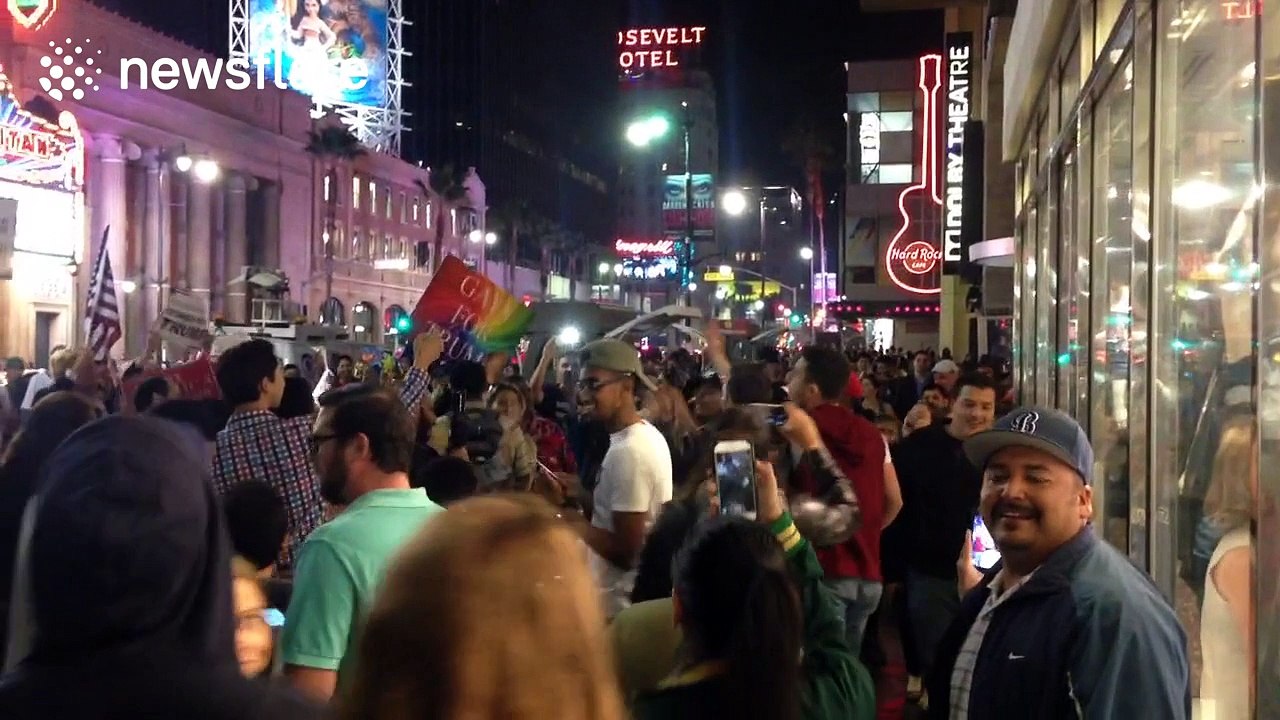 Anti-Trump protesters shout at supporters on Hollywood Boulevard