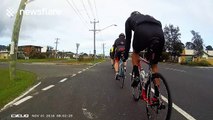 Nasty cycling crash sends one man flying over another