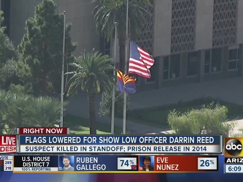 Flags lowered to honor Show Low officer shot, killed