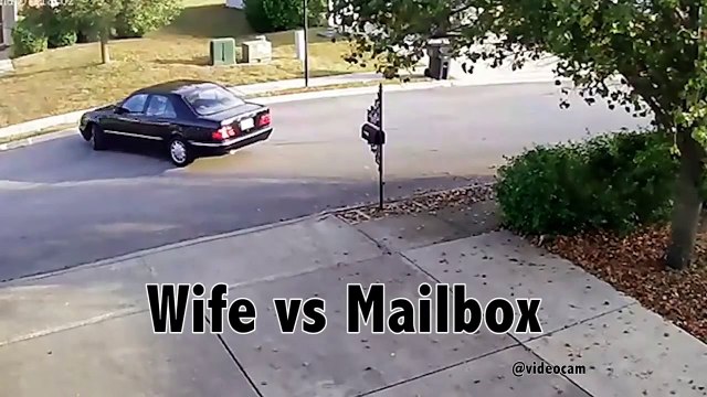 Femme au volant VS boite aux lettres