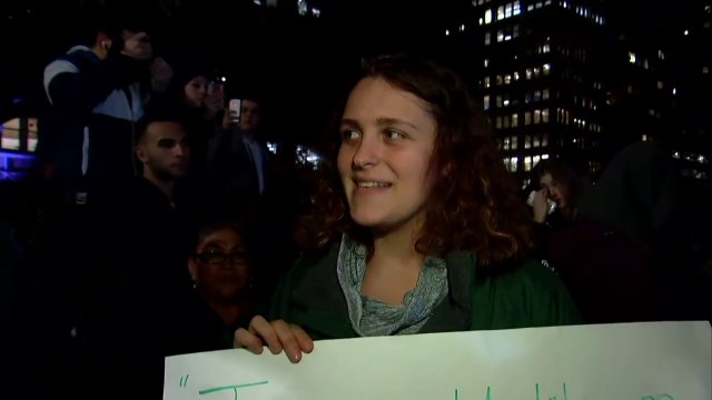 A young teacher is among the thousands of people protesting Donald Trump in New York City
