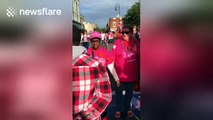 Man proposes to girlfriend at finish line of Breast Cancer Walk