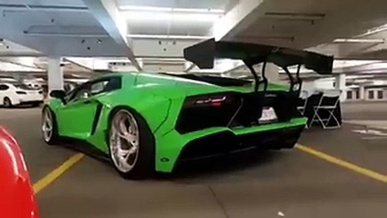 Lamborghini Aventador sounding good, and shooting flames.