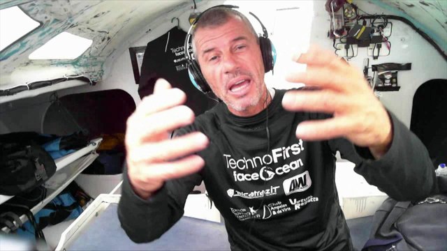 Dolphins playing along the boat of Sébastien Destremau / Vendée Globe