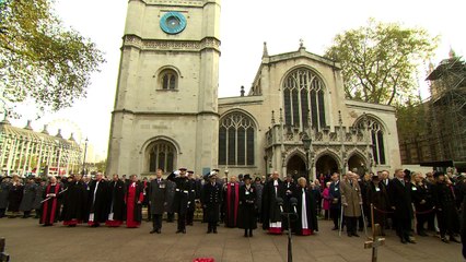 Harry and Philip lay crosses in Garden of Remembrance