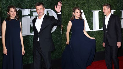 Brad Pitt and Marion Cotillard Pose Awkwardly At ‘Allied’ Premiere