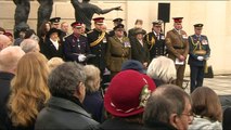 Prince Harry observes two minutes silence