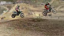 Biker has a bad landing and is ran over by 6 other competitors