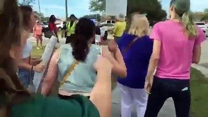 Fight breaks out between Trump supporter and protesters outside rally