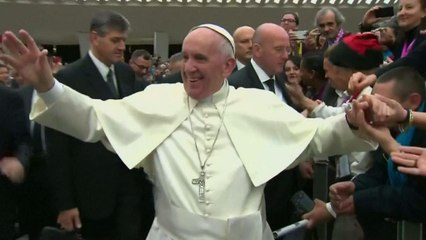 Pope prays with poor