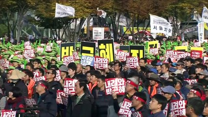 Massive protests call for South Korean president to resign