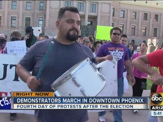 Demonstrators take to the streets of downtown Phoenix