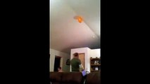 Dad Throws Son to Grab Balloon on Ceiling