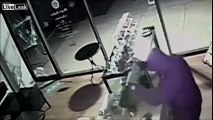 Robber Smashes Glass in Door .... Next Day, Waitress Falls Through Door