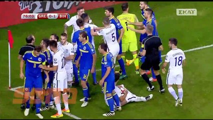 Edin Dzeko pulling down Papastathopoulos shorts after getting fouled