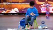 This 9 Year Old Chinese Boy Que Jianyu Uses His Hands And Feet Simultaneously To Solve A Rubiks Cube In Only 1 Minute 4