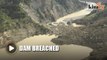 Slip dam breached on New Zealand river