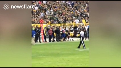 American football player Clay Matthews gets scared by squirrel