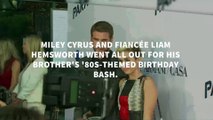 Miley Cyrus and Liam Hemsworth bring back the '80s in style