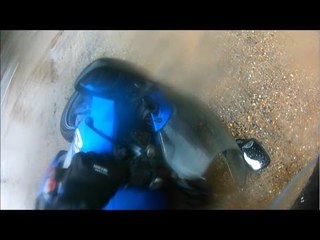 Скачать видео: Motorcyclist Tips Over at Roundabout