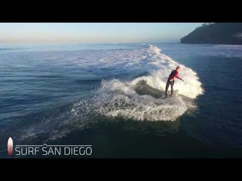 Scores of Surfers Majestically Catch Waves