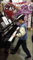 Little Kid Amazes Costco Shoppers with His Impromptu Piano Performance