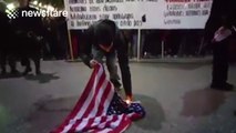 Protesters burn American flag during Obama's visit in Greece