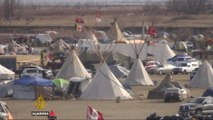 North Dakota pipeline: Native tribes defend sacred land