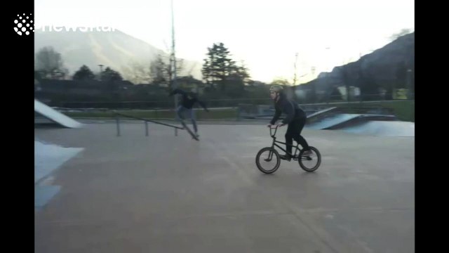 Nasty BMX face plant at skate park