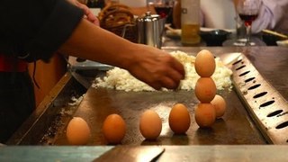 Teppanyaki Chef Cracks Egg Style.