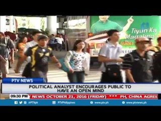 Political analyst encourages public to have an open mind