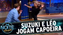 Dani Suzuki e Léo Lins jogam capoeira