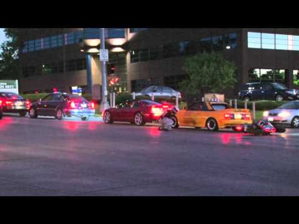 Motorcycle hits car