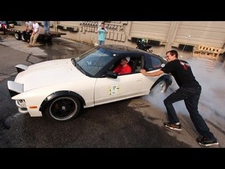 Assisted Cookies?!  240SX pops BOTH tires!