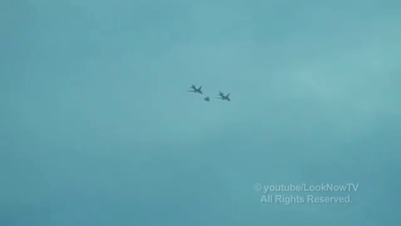 UFO SIGHTING TWO PLANES ESCORT TRIANGLE UFO AUGUST, 2013