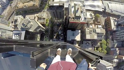 Daredevil Dangerously Stands On Edge Of Skyscraper