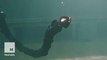 Red-eyed robot snake designed to be a janitor for the ocean bed